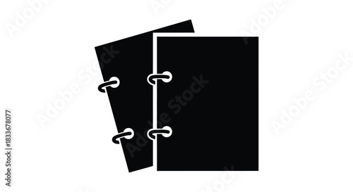 Two black notebooks with ring binders presented in a striking minimalist silhouette