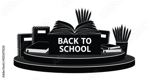 Back to school supplies arrangement with an open book and stationery