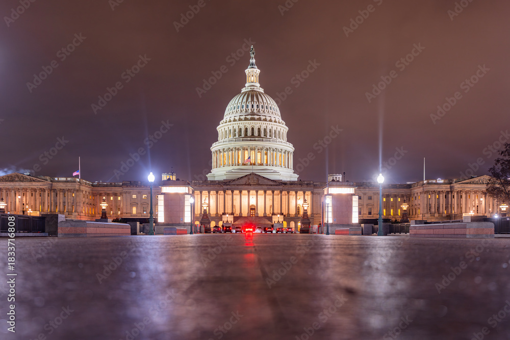 Fototapeta premium Washington DC captured at dusk. Illuminated US Capitol at night. Night view of the Washington Capitol building. Iconic Capitol building. United States Congress building.