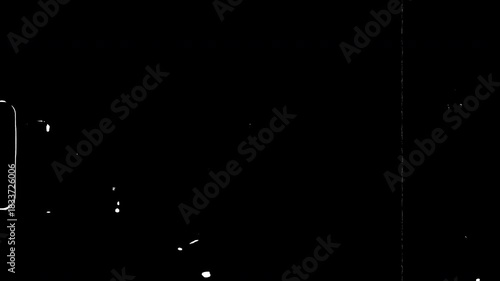 Old film leader countdown texture overlay with scratches and dust. Black and white vintage noise for video editing, cinema effect, and retro grunge background.