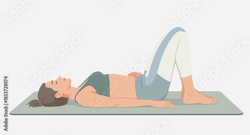 Woman lying on her back with knees bent, practicing a yoga pose on a mat.