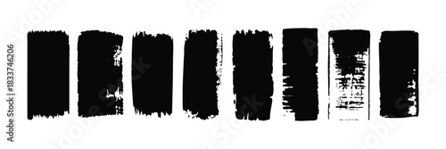Set of eight black, vertical, rough, and textured brush strokes or paint stamps for graphic design element