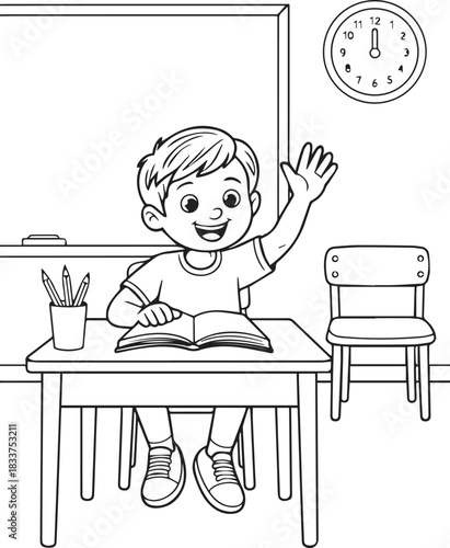 Smiling schoolboy reading a book at his desk happily raises his hand in the classroom