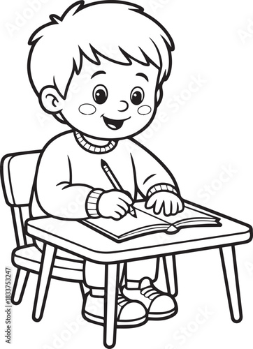 Young boy concentrates while writing with a pencil in his book at school