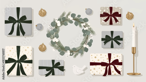 Flat lay of festive Christmas gift boxes, a wreath, and various holiday decorations on a light background, perfect for seasonal celebrations.