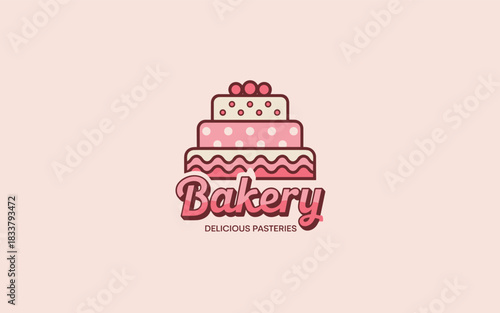 Pink tiered cake with polka dots and bakery text pastries