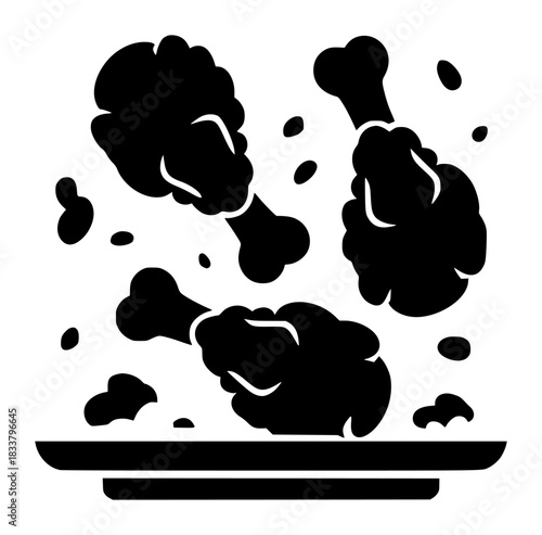 Black Silhouette of Fried Chicken Drumsticks on a Plate