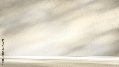 Beige room background with sunlight superimposed shadow leaves on the wall. autumn background template for product presentation concept
