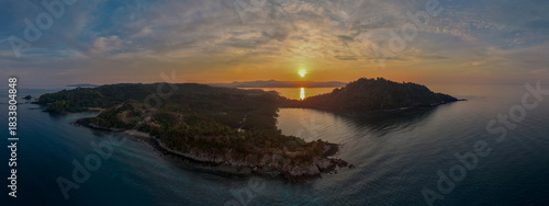 Tableau sur toile Panoramic sunrise aerial of Sakatia Island, Nosy Be, Madagascar – golden light over the ocean, tropical coastline, and peaceful island landscape