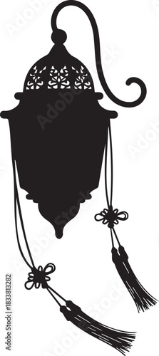 Ornate moroccan lantern silhouette with tassels hanging