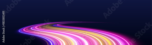 Spiraling neon light streaks glow vividly on a black background. Motion conveys energy and futuristic style. Ideal for digital art.