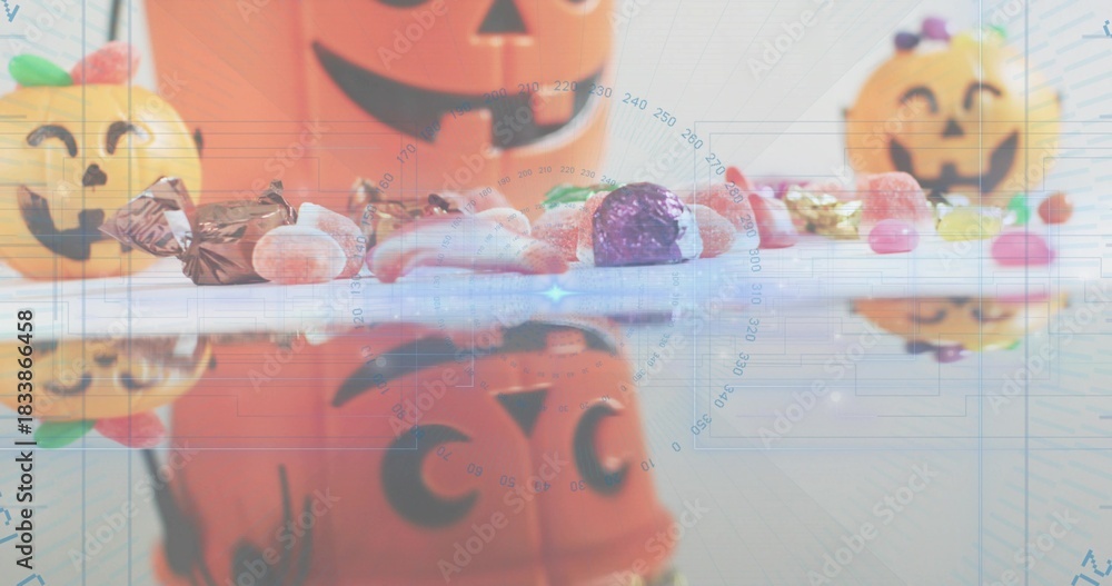 Fototapeta premium Displaying assorted Halloween candies and jack-o'-lantern buckets on glossy tabletop, blue overlay