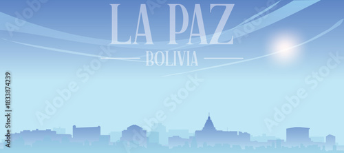 Blue panoramic poster of the city skyline with misty background buildings and clouds of LA PAZ, BOLIVIA