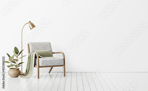 Modern simple living room with gray mid-century armchair, floor lamp and  house plant in rough ceramic pot. Cozy and comfortable home design. White and light empty interior wall background. 3D render.