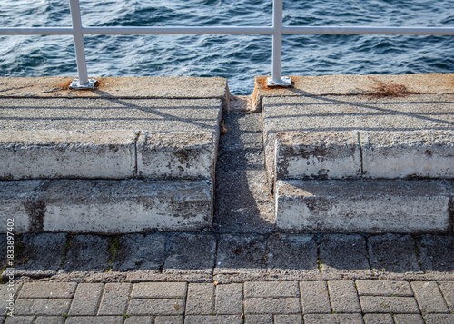 A water drainage channel. built on a concrete pier for rainwater drainage.