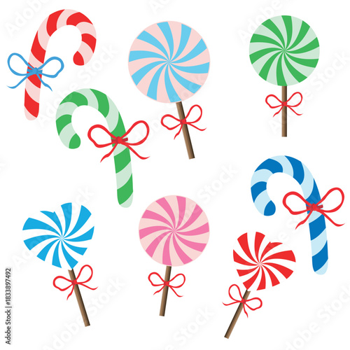 A set of lollipops in various colors and flavors. Festive candies of different shapes, hearts, a classic cane and round lollipops.