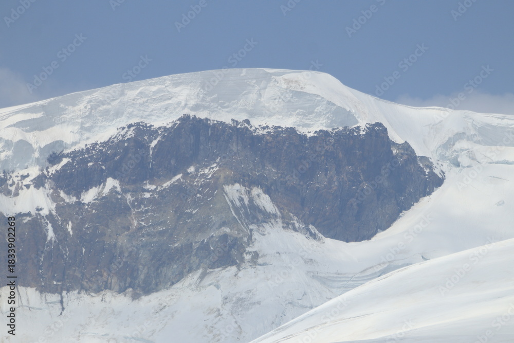 Obraz premium Mountain landscape of the North Caucasus mountains near Mount Elbrus on a sunny summer day