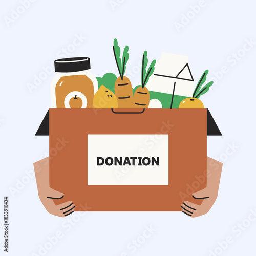 Supporting The Community With A Box Full Of Essential Groceries For Those In Need