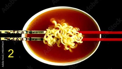 year of the fire horse 2026, with the text 2026 year of the fire horse in Chinese letters over a Chinese noodle soup with chops sticks
