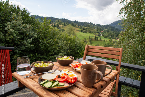 delicious breakfast outdoors in the mountains