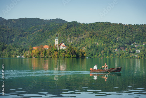 Wallpaper Mural Pilgrimage Church of the Assumption of Mary (Bled Island Church). Bled Island. Stunning Panoramic View of Lake Bled with Iconic Island and Castle, Slovenia. Romantic spot. Typical Bled boat (Pletna). Torontodigital.ca