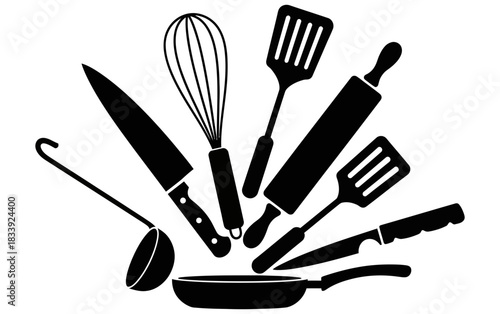 Kitchen utensils arranged creatively for culinary arts and cooking themed designs