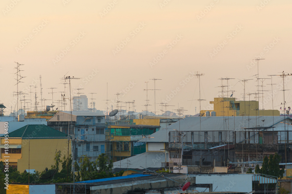 Fototapeta premium Old style radio and television antenna on the roof of an old house in Thailand