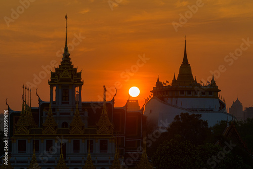 Wat Phu Khao Thong, Bangkok, Thailand at sunrise, silhouette golden mountain