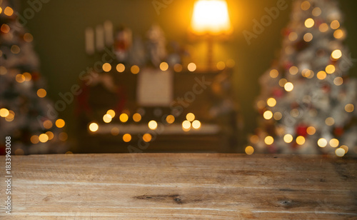 Wooden table and Christmas lights in background