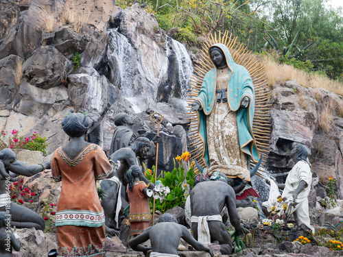 Statues of Our Lady of Guadalupe appearing to St. Juan Diego and indigenous people