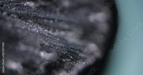 Zinc Drop under Microscope Smooth Focus Magnification 100x, Visible Surface Texture Metallic Shine, Chemical Laboratory Research Science, Scientific Metallurgy Material Analysis Detailed View