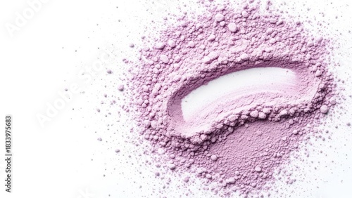 Pile of light purple powder with a curved indentation on a clean white surface