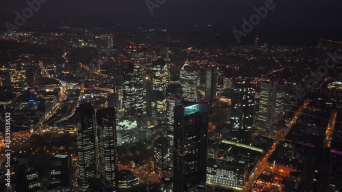 Wallpaper Mural Tripod aerial perspective of illuminated skyline of Frankfurt, Germany. Soaring skyscrapers and city lights of financial hub Torontodigital.ca