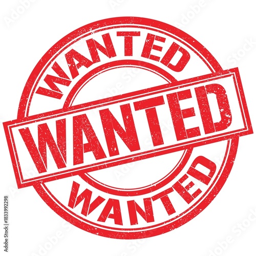 WANTED text written on red stamp sign