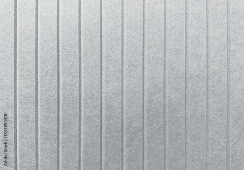 Concrete wall with vertical grooves and rough surface pattern background.