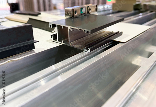 Black aluminium anodised extrusion profile cross section background.