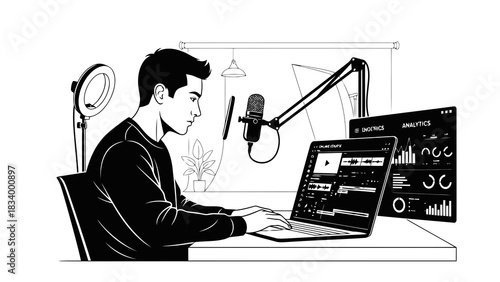 Man creating online content with microphone and laptop