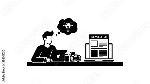 Creative professional developing newsletter ideas with laptop and camera