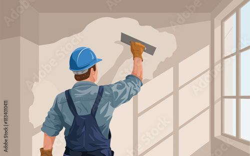 Skilled worker in hard hat and overalls carefully applying plaster to a wall with a trowel, renovating interior space