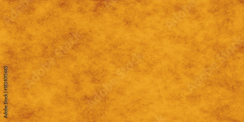 Aged vintage brown parchment paper texture with a dirty grunge background pattern. Abstract grunge painted yellow or orange background, stylist grunge blurry yellow or orange watercolor background 