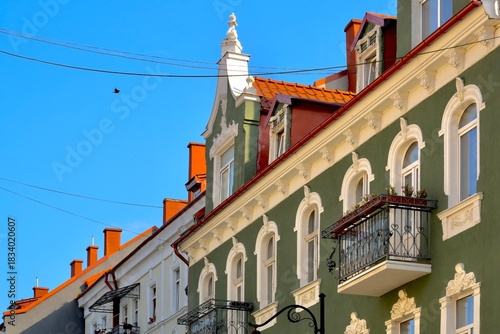 Buildings in the city in the summer against the sky