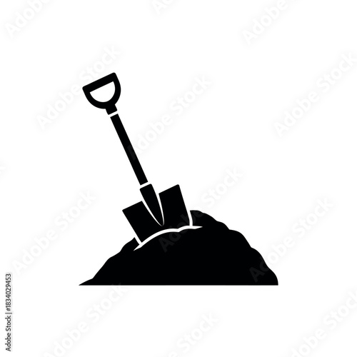 Fotografi Shovel in a Pile of Dirt.