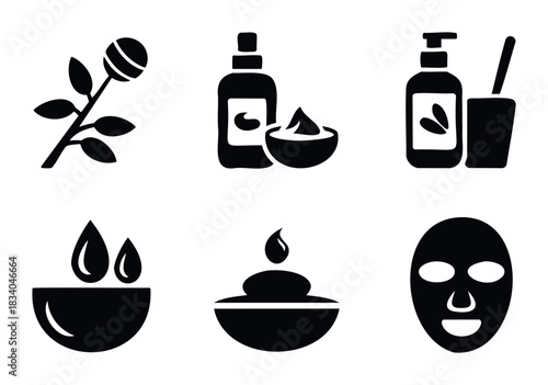 Set of cosmetic and spa icons representing skincare products, rose branch, liquid drops, and face mask for beauty and wellness applications