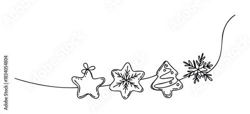 Holiday string garland with star, snowflake, and Christmas tree cookies for festive winter celebration decorations and seasonal greetings