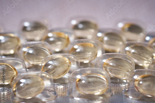 Vitamin D3 capsules in a blister pack close-up. Selective focus