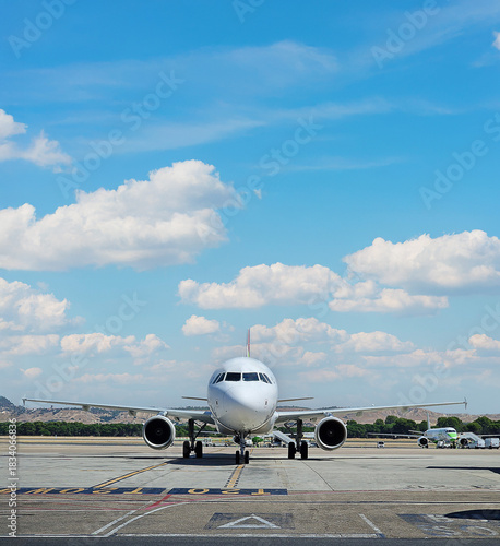 commercial airplane parked on the takeoff platform for a tourist trip