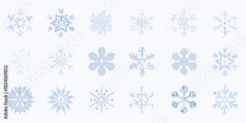 Collection of light blue distressed snowflake designs on white background