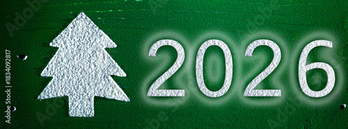 Christmas Tree from Snow on Green background. Happy New Year 2026 Background. Holiday, Winter, Card, Congratulation. Panoramic banner.