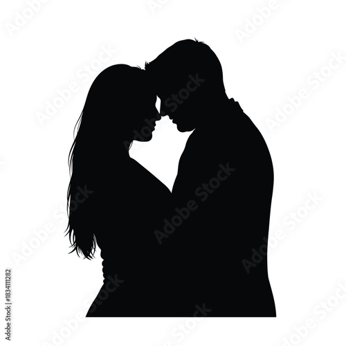 Romantic couple embracing in a tender silhouette