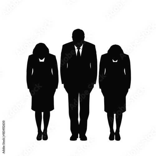 Three business people bowing in silhouette